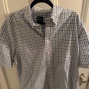 New, with tag, short sleeve button down. Never worn, not my size.